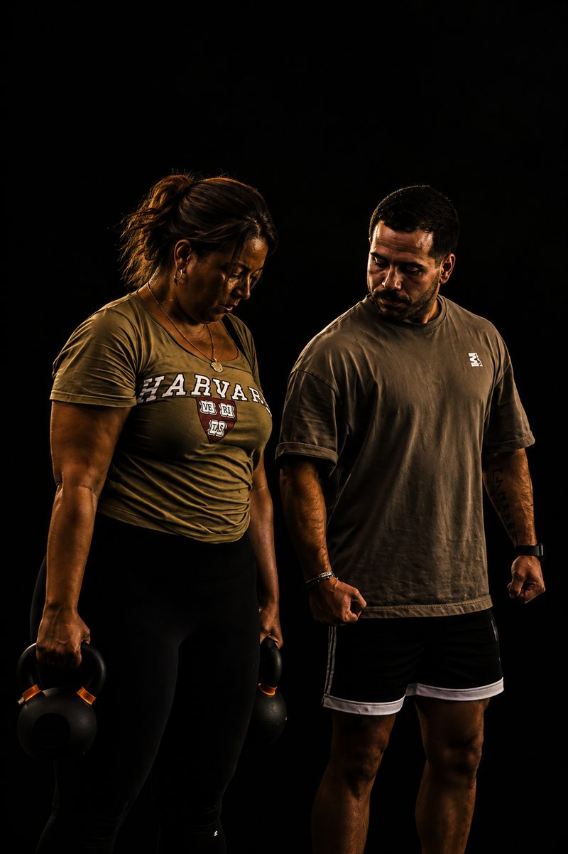 Accompagnement d'une cliente avec kettlebells